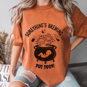 Brewing Baby Comfort Colors Halloween Maternity T-shirt, Halloween Pregnancy Shirt, Halloween Party Costume Idea, Witchy Baby Shower Gift