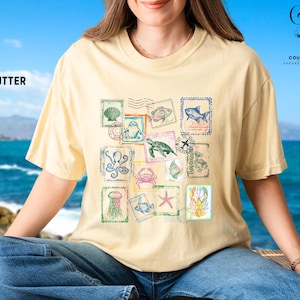 Meerestiere 90er Jahre Porto Komfort Farben T-Shirt, Retro Ocean Wildtier Küsten T-Shirt, lebendige Unterwasser Briefmarken Shirt, Sommer Strand Vibes Geschenk