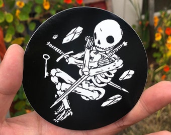 Skeleton with Sword In Ground Vinyl Sticker by Deth P. Sun