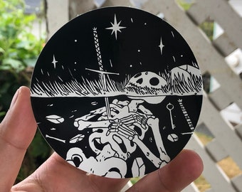 Skeleton in Ground Vinyl Sticker by Deth P. Sun