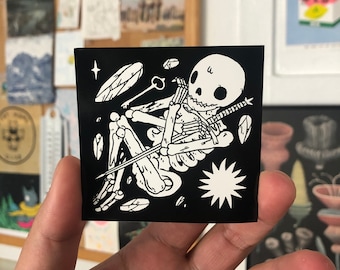 Skeleton in Ground Vinyl Sticker by Deth P. Sun