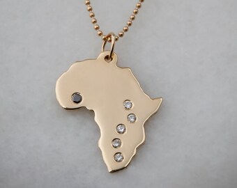 Large 14k Africa + 6 Diamonds