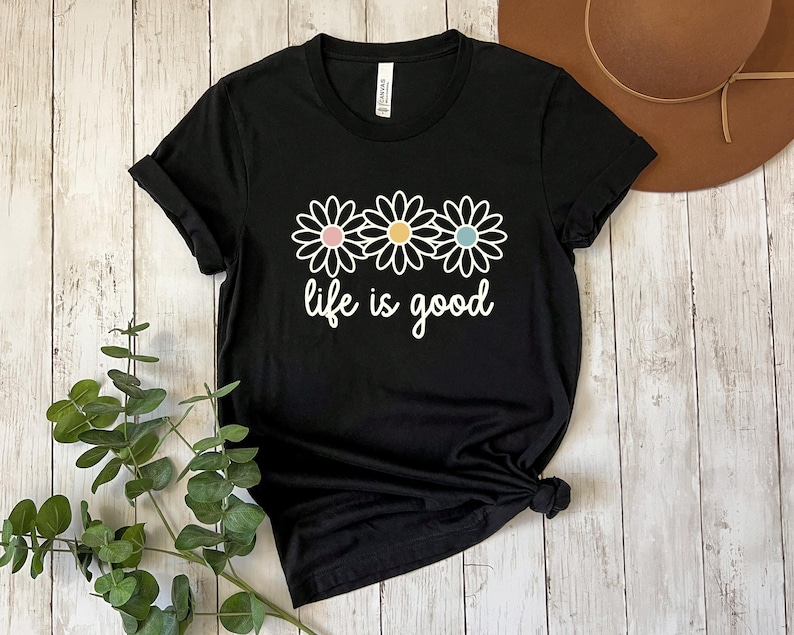 May include: A rustic wooden sign with the text "Welcome to our home" in white lettering. The sign has a distressed finish and a simple, inviting design, suitable for a front porch or entryway.