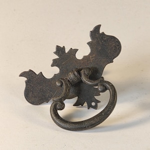 May include: A set of three ceramic mugs with a speckled, matte finish. The mugs are in shades of cream, light gray, and dark gray. Each mug has a simple, minimalist design, perfect for coffee or tea.