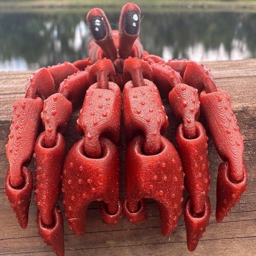 Figura articulada de cangrejo ermitaño: crustáceo coleccionable y articulado con caparazón extraíble.