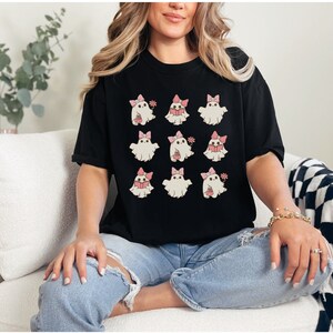 Pink ghost Halloween shirt, girly Halloween shirt, pink ghost, cute ghost shirt, bookish Halloween, ghost with flower, pink ghosts Halloween