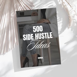 May include: A black and white image of a person sitting at a desk with a laptop. The text "500 Side Hustle Ideas" is written in white on a black background. The text "novice." is written in white on a black background.