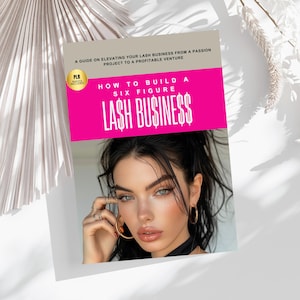 May include: A pink and white guidebook with the title "How to Build a Six Figure Lash Business". The cover features a woman with long dark hair and a neutral makeup look.