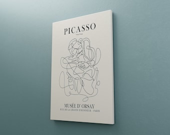 May include: A black and white line drawing of a couple embracing, with the text "PICASSO The Kiss" and "MUSÉE D'ORSAY RUE DE LA LÉGION D'HONNEUR - PARIS" below the image.