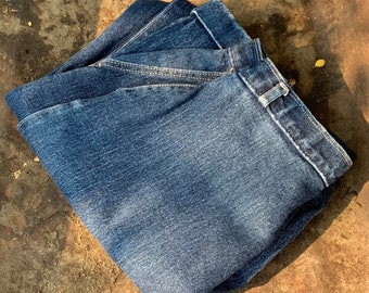 Jeans vintage anni '80 a vita alta con pieghe: gamba affusolata, taglia 27x29