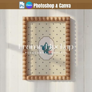 May include: A rectangular wooden frame with a decorative border of small, round wooden beads. The frame holds a print with a cream-colored background and a pattern of small black floral motifs. The print features a central illustration of a teapot and teacup.