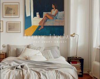 May include: A framed painting of a woman sitting on a couch with a white cat. The painting is in a bedroom setting with a bed, a nightstand, and a lamp.