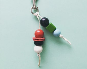 Keyring handmade by Mainichi wooden beads on leather