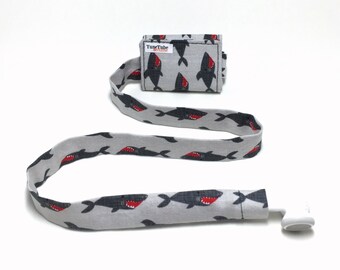 Gray shark TuneTube.  Earbud cord organizer for iPhone or iPod.  Cord keeper.  Earbud holder.  Earbud case.