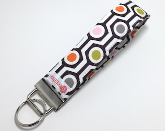 Keychain. Key fob.  Wristlet keychain.  Key wristlet.  Key holder.  Multicolored dots in hexagon pattern.