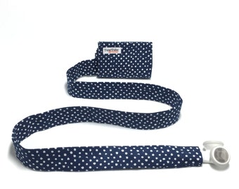 Navy and white polka dots TuneTube.  Earbud cord organizer for iPhone or iPod.  Cord keeper.  Earbud holder.  Earbud case.