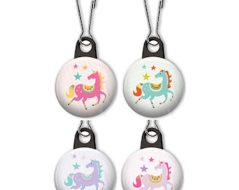May include: Set of four zipper pulls featuring colourful unicorn designs on a white background with pink, blue, and purple accents. Each pull has a black zipper and a white background with a polka dot pattern.