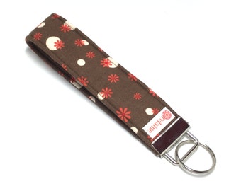 Brown keychain, key fob, key wristlet, key holder, key chain.  Coral flowers on brown fabric.  Fabric keychain wristlet.