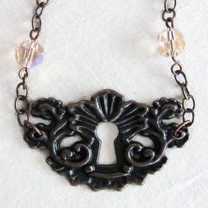 Francisca - antique copper keyhole and charm necklace - steampunk necklace - keyhole necklace