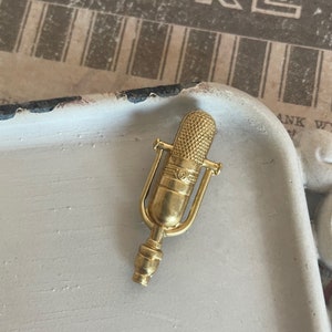 Brass microphone pin