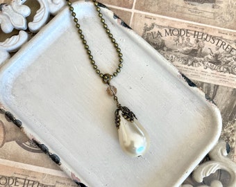 Arlena Pearl - Large teardrop pearl necklace on antique gold necklace