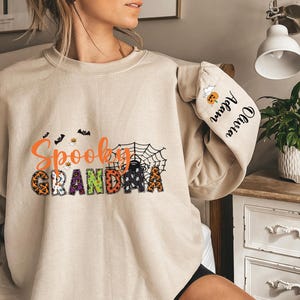 Custom Halloween Spooky Grandma Sweatshirt with Kids Name on Sleeve Sweatshirt, Cool Mama Halloween Sweatshirt, Mama Halloween Gift,Custom