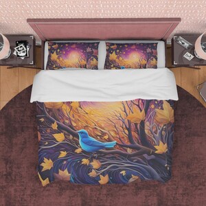 May include: A blue bird perched on a branch in a forest scene with swirling purple and yellow colors. The background features a swirling pattern of leaves and branches. The duvet cover is white with a subtle texture.