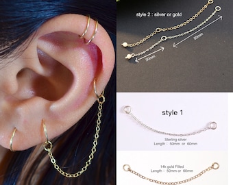 May include: Two styles of ear chain jewelry. Style 1 is a single chain with a length of 50mm or 60mm, available in sterling silver or 14k gold filled. Style 2 is a double chain with a length of 30mm or 50mm, available in silver or gold.