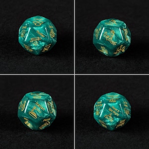 four images of a green dice with gold writing on it