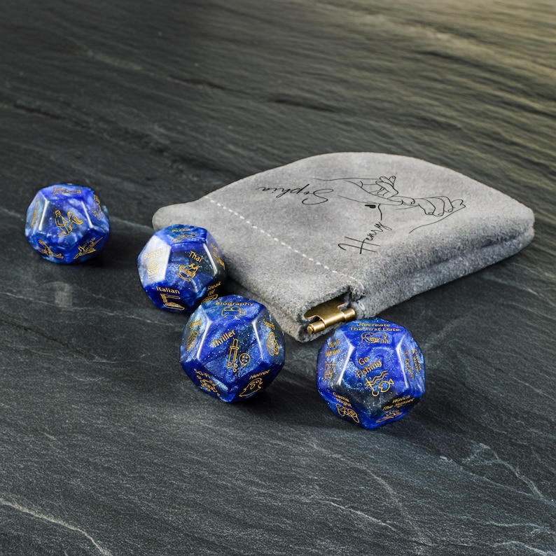 a bag with some blue dices on a table