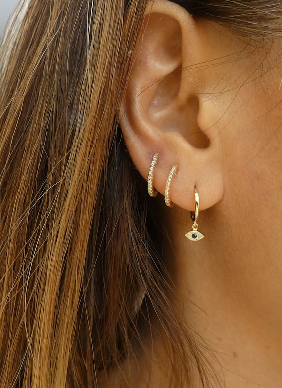 Sapphire hoops gold Tiny hoop earrings Huggie earrings Dainty earrings Minimalist earrings Eye charm gold hoops Cz evil eye earrings