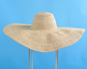 Handwoven straw hat with wide brim for summer beach - natural color