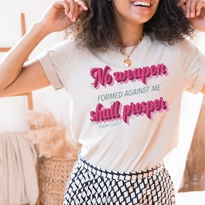 Nenhuma arma formada contra mim prosperará Isaías 54:17 Camiseta inspiradora cristã Bella Canvas Graphic T-Shirt Gift
