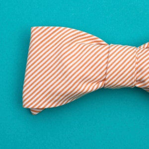orange and white striped bow tie // self tie bow tie for men & women // peaches and cream micro stripe bow tie image 2
