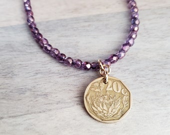 South Africa Arum Lily Coin Necklace, Purple Glass Bead Chain, Bronze Hook Clasp, Old Coin Charm, Made in USA, E. Ria Designs, Gift Box
