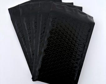 Buste imbottite nere: Materiale per spedizioni per piccole imprese (22,2 x 12 cm)