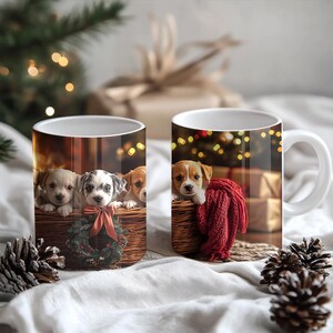 May include: Two white ceramic mugs with Christmas-themed designs featuring adorable puppies. One mug shows three puppies in a basket with a Christmas wreath, while the other mug shows a single puppy in a basket with a red scarf.