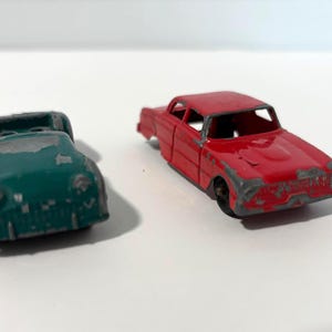 Two Vintage 1960s TootsieToy Die-Cast Toy Cars | 1956 Triumph TR-3 and 1960 Ford Falcon