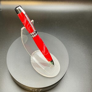 Beautiful Red and pink stylish princess pen sparkles with pink Swarovski crystals on band and clip.  This pen makes a wonderful gift.