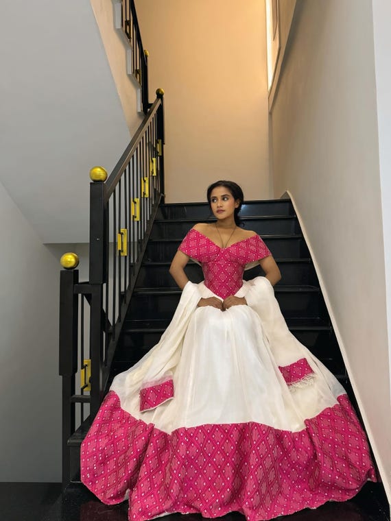 off shoulder habesha dress Tenaye Off-Shoulder Habesha Dress with Red Hem V-Neckline Habesha Kemis