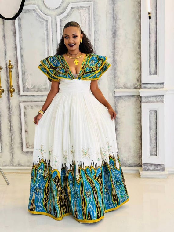 gold ethiopian wedding dress Elegant Brown Ethiopian Dress with Golden and Turquoise Patterns, Habe