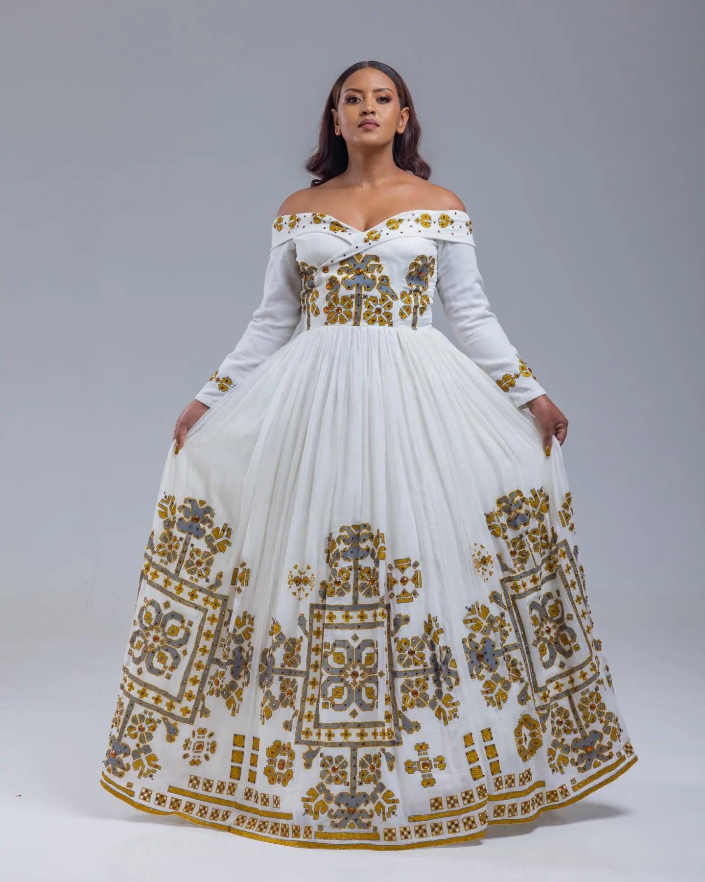 enku design wedding dress Off-shoulder Ethiopian Habesha Kemis | Gold & Silver Embroidery Habesha | Royal Style Ethiopian Dress Relaxed Denim Mini Dress Size:L/XL (US 9-12) Cettire Made:  Tunisia Ethiopian traditional dress Tailored fit and breathable