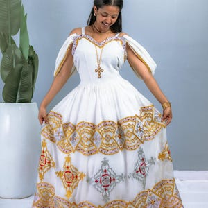Modern Habesha Dress with Cold Shoulder | Intricate Gold & Silver Embroidery on White Cotton | Elegant Habesha Dress Hab205