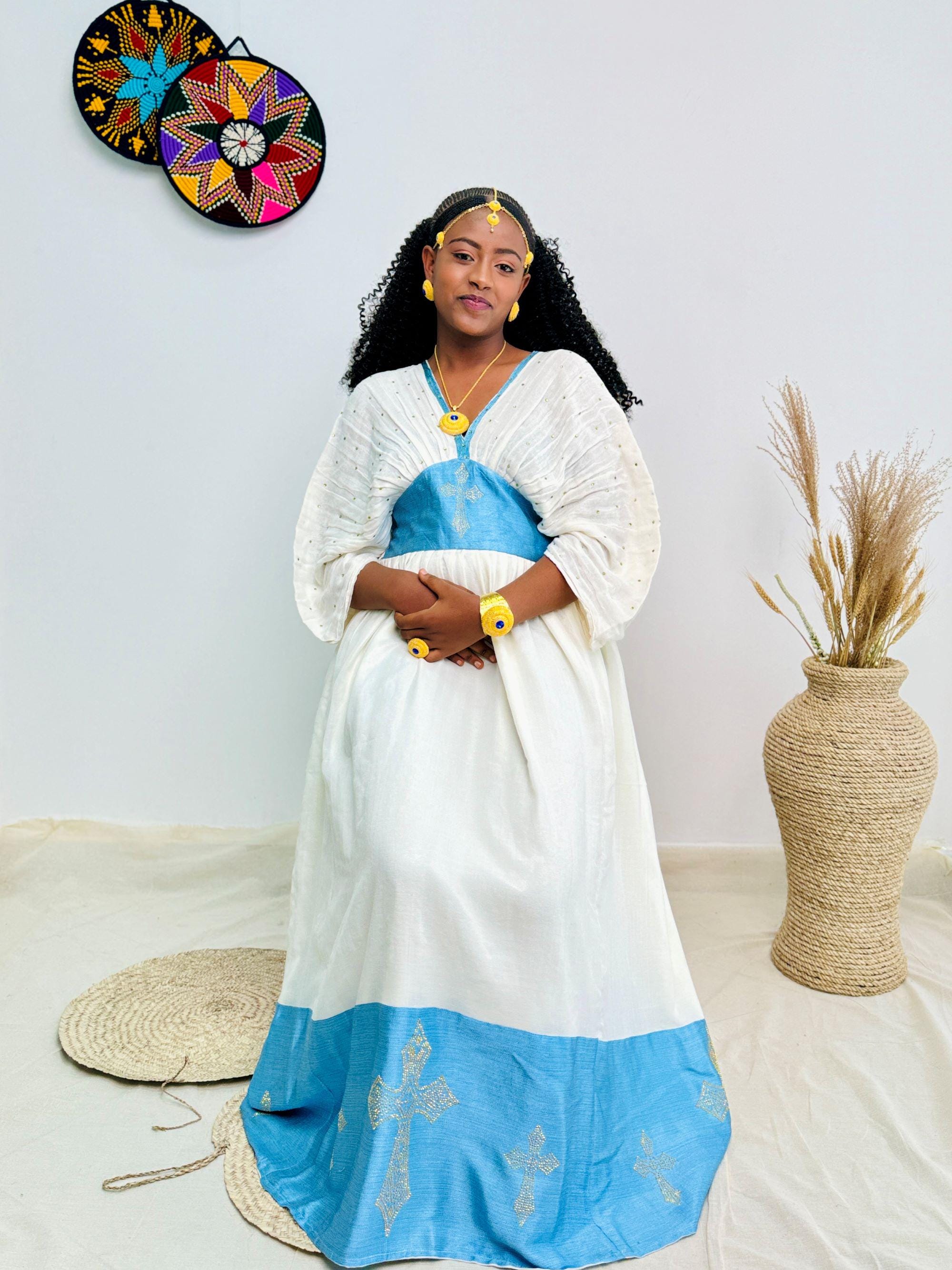 Traditional Ethiopian Habesha Dress | White & Sky Blue Handwoven Kemis with Gold Cross Motif | Elegant Fit with Tilet Detail Hab221