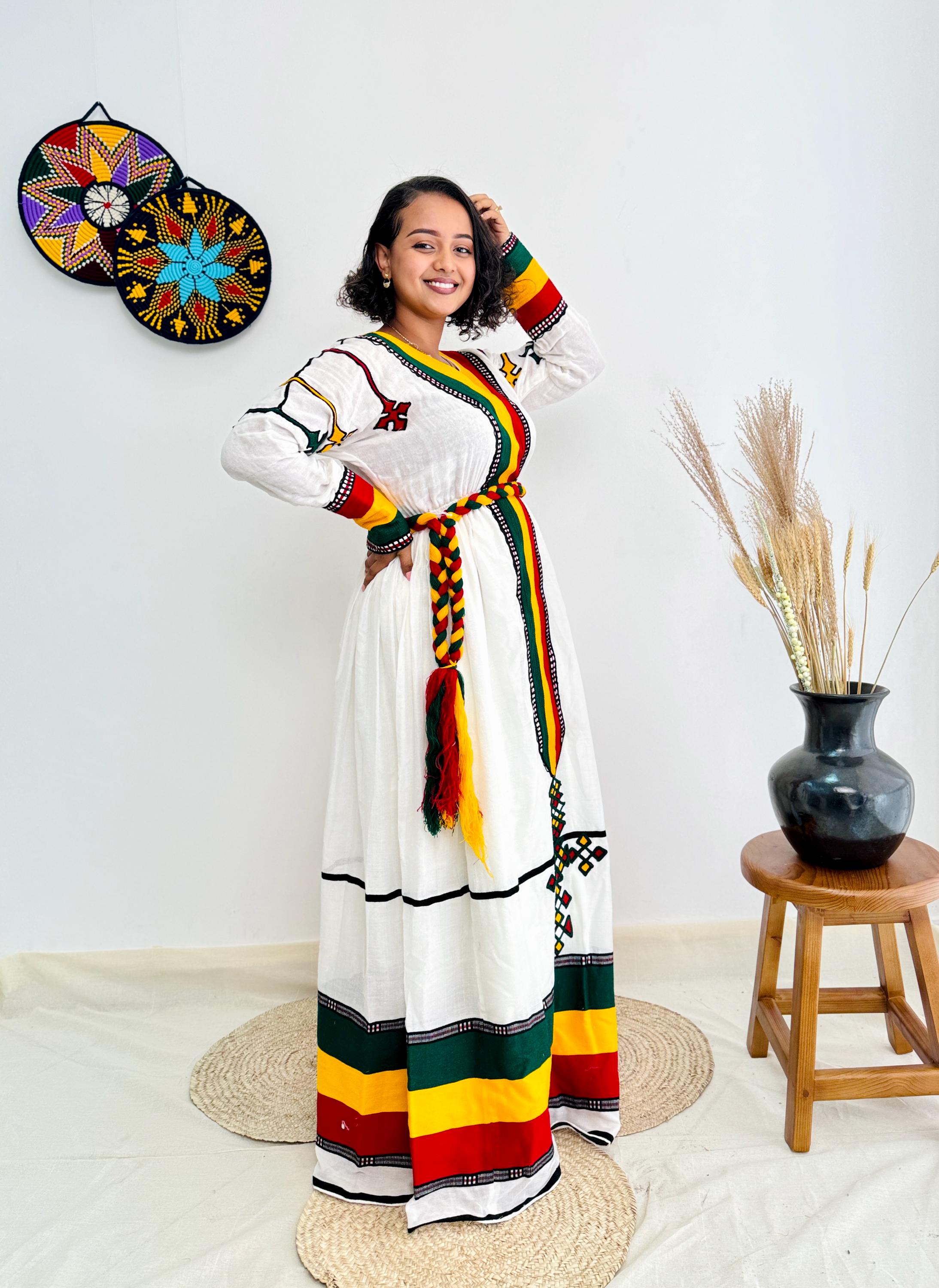 Ethiopian Flag-Inspired Habesha Dress with Bold Green, Yellow, and Red Accents Stylish Ethiopian Dress for Cultural Pride Hab05 Ethiopian Flag-Inspired Habesha Dress with Bold Green, Yellow, and Red Accents Stylish Ethiopian Dress for Cultural Pride Hab05