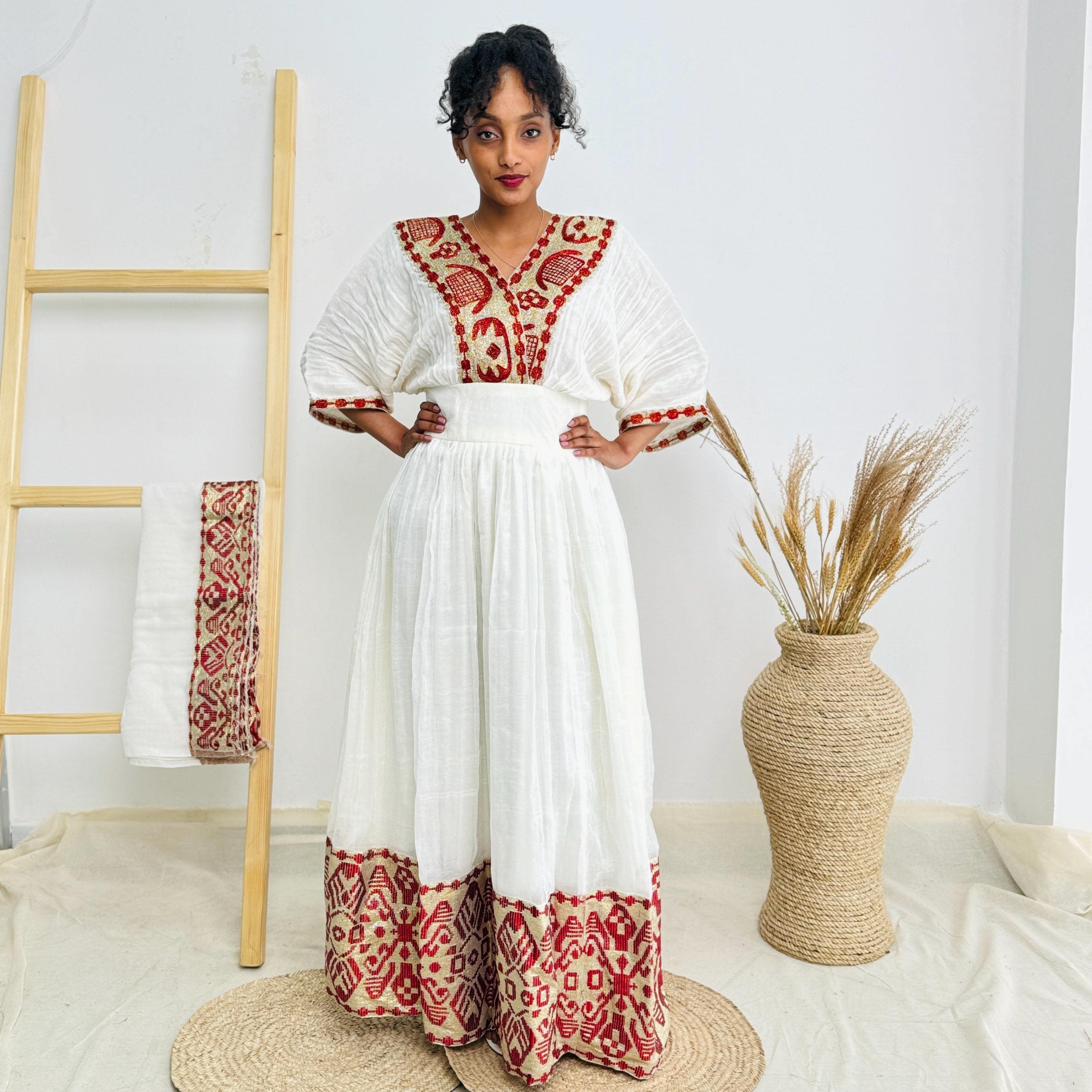 Elegant Habesha Dress with red embroidery – Handwoven Ethiopian Dress for Women with Golden Tibeb