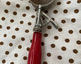 Red Bakelite ice cream scoop