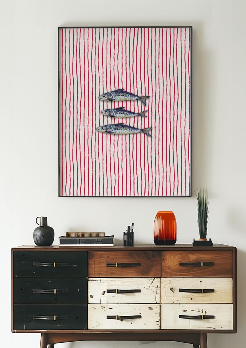 Striped sardines printable wall art displayed in a modern coastal kitchen setting