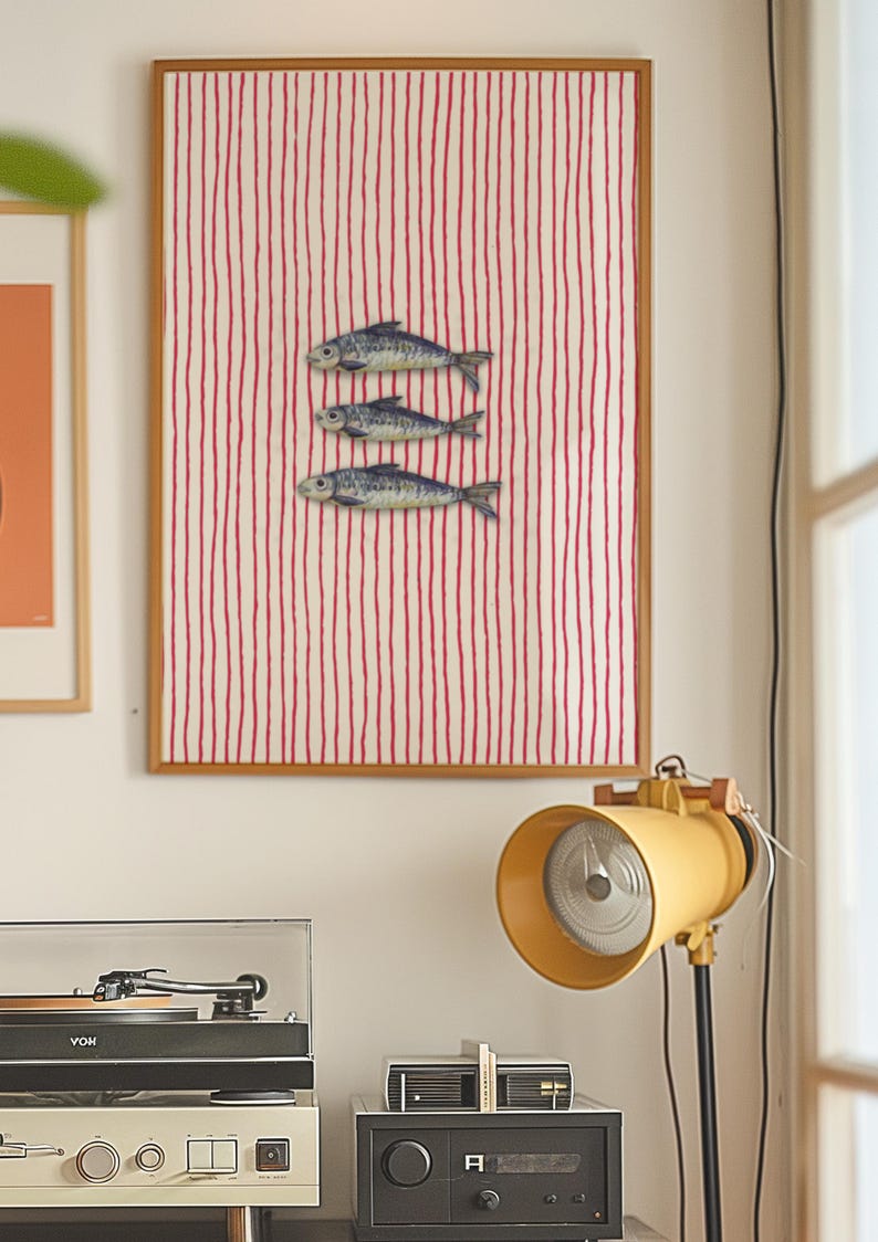 Striped sardines printable wall art displayed in a modern coastal kitchen setting