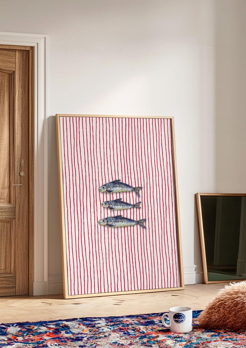 Striped sardines printable wall art displayed in a modern coastal kitchen setting